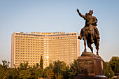Amir Timur statue, in Amir Timur square, and Hotel Uzbekistan, Tashkent, Uzbekistan