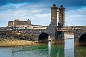 Puente de Las Bolas bridge and Castillo de San Gabriel castle, Lanzarote, spain
