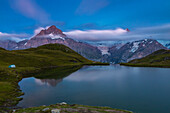 Twilight at Bachalpsee and a tent, Jungfrau region, Canton Berna, Oberland, Switzerland, Western Europe