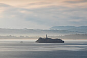 Mouro lighthouse at sunrise, Cabo Mayor, Santander, Cantabria, Spain, Western europe