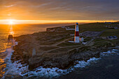 Aerial view of Portland Bill Lighthouse at sunset, Isle of Portland, Dorset, United Kingdom, Northern Europe