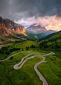 Aerial view of Gardena Pass at sunset after a storm. Dolomites, South Tyrol, Bolzano district, Italy, Europe.