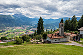 Aerial view of Val Seriana, Clusone city and Presolana from the hills of the small church of San Lucio. Val Seriana, Bergamo district, Lombardy, Italy.