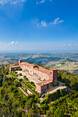 Aerial view of the Montalto castle on a hill overlooking all of Oltrepo Pavese. Montalto Pavese, Oltrepo Pavese, Pavia district, Lombardy, Italy.