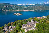 Aerial view of the Sacro Monte of Orta and San Giulio island on Lake Orta in the summer. Orta Lake, Province of Novara, Piedmont, Italy.
