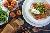 Green beans salad, tomatoes, hazelnuts and fresh ricotta: foods allied to our health
