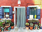 Burano, typical colored houses, red house; Burano, Venice, Veneto, Italy, south Europe