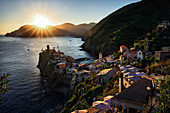 National park of Cinque Terre, wiew of Vernazza with sun in sunset time; Vernazza, Liguria, Italy, Europe, south Europe, north Italy