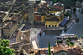 Center of Riva del Garda, panoramic photo with vision of the Apponale tower, Catena square, 3 november square, harbory during the morning Riva del Garda, Trentino alto adige, province of Trento, north Italy, south Europe