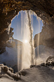 Europe, Iceland: Kvernufoss, the epic view as seen from behind the water fall