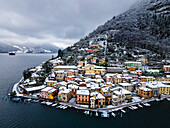 Aerial view of Peschiera Maraglio village in Montisola in winter season, Brescia province in Lombardy district, Italy, Europe.