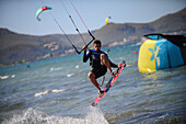 Kitesurfing in Port de Pollenca beach, Mallorca, Spain