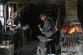 Blacksmith, kings landing, historic anglophone village, prince william parish, fredericton, new brunswick, canada, north america