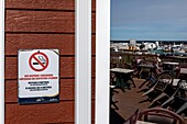 Sign forbidding smoking and vaping within a 9 meter radius of the restaurant and terrace, caraquet, new brunswick, canada, north america