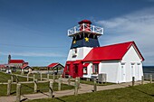 Wood lighthouse in acadian colors, new brunswick, canada, north america