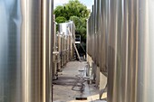 Stainless steel wine vats, vini services company, port of blaye, gironde, france