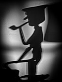 Silhouette of a pipe smoker