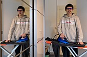 A totally autonomous resident doing his ironing, care home for adults with moderate mental disabilities, residence du moulin de la risle, rugles, eure, normandy, france