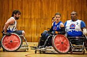 Handi rugby training, team sports for handicapped people in wheelchairs