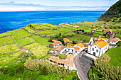 Aerial view of the igreja de Nossa Senhora do Carmo, Faja Grande, Lajes das Flores, Flores Island (Ilha das Flores), Azores archipelago, Portugal, Europe