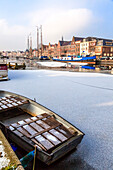 Frost and ice covering the Spaarne river old canal in winter, Haarlem, Amsterdam district, North Holland, The Netherlands