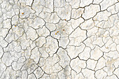 Aerial view of dry cracked soil due to summer drought, Kefalonia, Greece