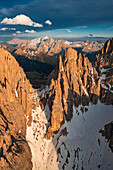 Aerial view of Sassolungo group Cinque Dita and Marmolada at sunset, Dolomites, South Tyrol, Italy