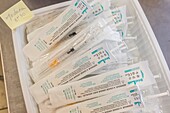 Preparing the doses of the moderna covid 19 vaccine, covid 19 vaccination center, gymnasium, les sables d'olonne, vendee, pays de loire, france, europe