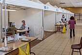 Meeting with a doctor before the inoculation, covid 19 vaccination center, gymnasium, les sables d'olonne, vendee, pays de loire, france, europe