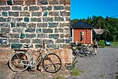 Bicycle in Hotel Nestor in Korpo or Korppoo island, Korpostrom coast Southwest Finland Turku archipelago. The archipelago ring road or Saariston rengastie is full of things to see, do and do. The Archipelago Trail can be taken clockwise or counter clockwise, starting in the historical city of Turku, and continuing through rural archipelago villages and astonishing Baltic Sea sceneries. The Trail can be taken from the beginning of June until the end of August.