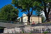 Promenade on the banks of the River Aura in Turku Finland.