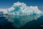 Iceberg reflection in calm waters, Larsen Inlet, Weddell Sea, Antarctica.