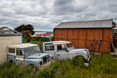 Abandoned Land Rover vehicles in Stanley, the capital of the Falkland Islands. Stanley, Falkland Islands.