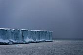 The cliffs along the southern edge of the Austfonna ice cap. Nordaustlandet, Svalbard, Norway