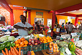Locals shopping at the farmers' market in town. Victoria, Mahe Island, The Republic of the Seychelles.