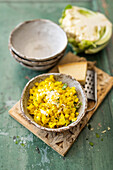 Cauliflower and potato risotto with cashew nuts and parmesan cheese