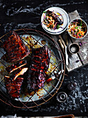 Smoked spare ribs with BBQ glaze and coleslaw salad