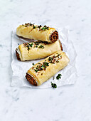 Lentil sausage rolls with lemon thyme salt sprinkle