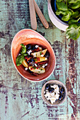 Mediterranean potato salad with olives, sun-dried tomatoes and cheese