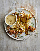 Hasselback fennel with caraway and gruyere cream sauce