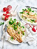 Fish with fennel and pomegranate salad