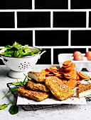 Haloumi schnitzels and sweet potato chips