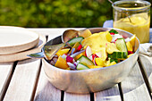 Radish and cucumber salad with mango