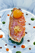 Red mullet on spinach