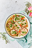 Boneless pork chops with spring vegetables