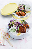 Carrot and millet patties with sunflower slaw