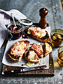 Crostini with cherry chutney, bacon and cheese
