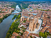 Gothic Saint Cecile Cathedral in Albi town. Pont Vieux bridge and the Church of Notre Dame du Breuil in Tarn village, Languedoc-Roussillon Occitanie Midi Pyrenees France.