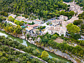 Aerial view Saint Guilhem le Desert, labelled Les Plus Beaux Villages de France (The Most Beautiful Villages of France), a stop on el Camino de Santiago, Herault, France.