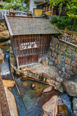 Kumano Kodo pilgrimage route. Tsuboyu is a small bath in the creek enclosed by a rustic wood cabin. Yunomine Onsen village. Hot spring village. Hommiyacho. Tanabe. Wakayama Prefecture. Kii Peninsula. Kansai region. Honshü Island .UNESCO World Heritage Site. Japan